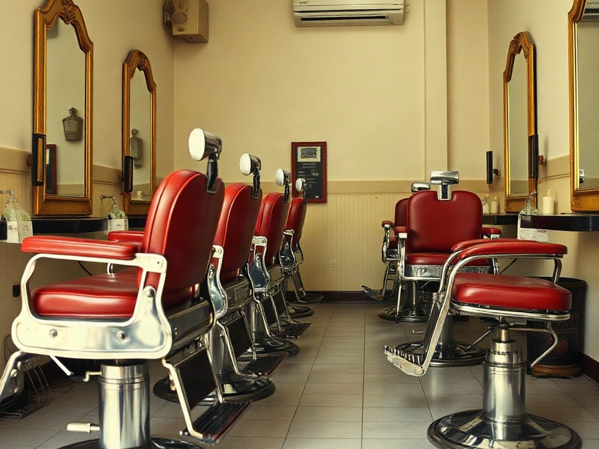 The full row of mirror stations and barber chairs running the length of the shop at Rio Vista